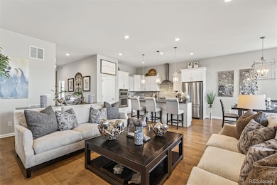 Living Room. Open living concept with lots of natural light, birch flooring.