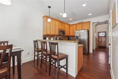 Kitchen with kitchen peninsula, pendant lighting, 
