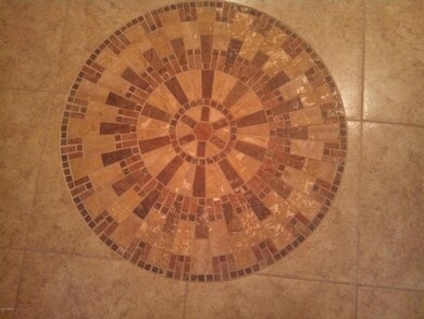 MEDALLION IN ENTRY FOYER