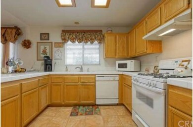 View of kitchen with plenty of cabinet and counter