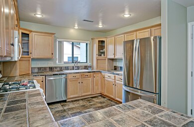 Maple Cabinets, tile counters