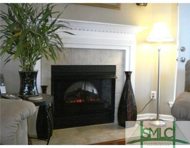 Living Room. WOOD MANTLE AND ELECTRIC FIREPLACE MA