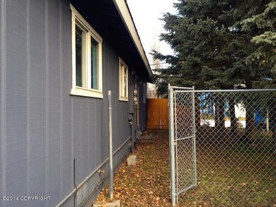 Back View and Fenced Yard