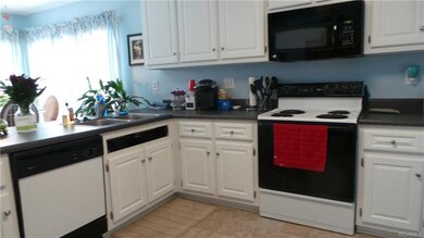 Kitchen - new cabinets & floor