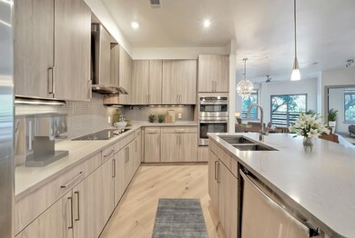 Kitchen featuring a sink, appliances with stainle