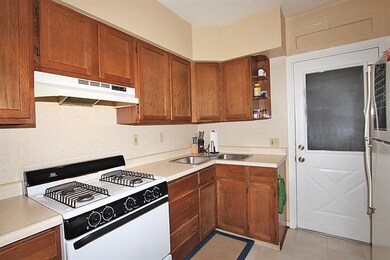 First floor kitchen that leads out to a mud/storag