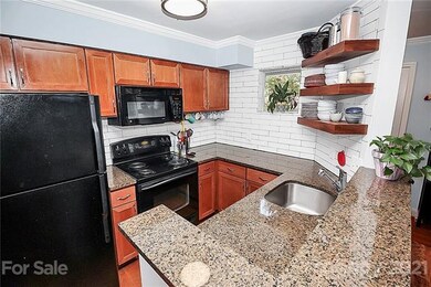 New subway tile surrounding the kitchen
