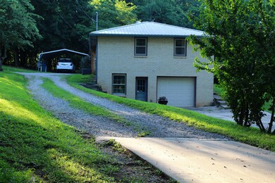carport around back of home!