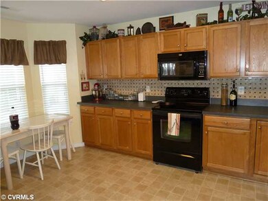 Kitchen - Open kitchen with breakfast nook and pan
