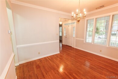 Picture perfect dining room with large window over