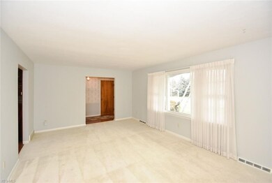 Living Room with large front window.