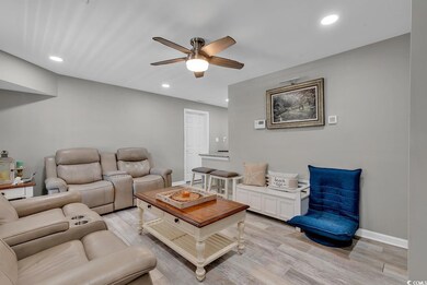 Living room featuring light wood-type flooring and