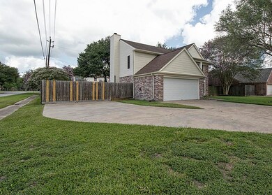 This beautiful home sits in a wonderful corner lot with extra room that would be perfect for a boat or a camper!