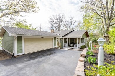 Plenty of parking, 2.5 car garage, blacktop drivew