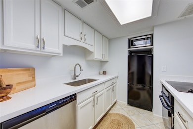 This kitchen has Carrera marble countertops and comes with all appliances.