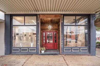 Entrance to property with brick siding