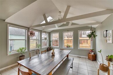 Large sunroom, dining room, or play room right off