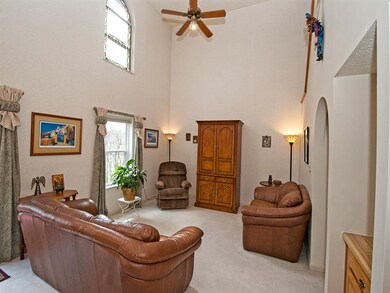 High Ceilings and Tiffany Inserts in Windows