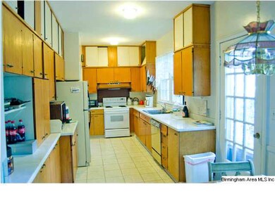 Kitchen located on back of house.