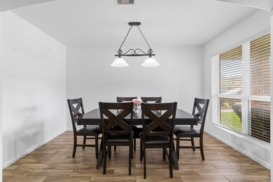 This photo showcases a bright dining area with a m