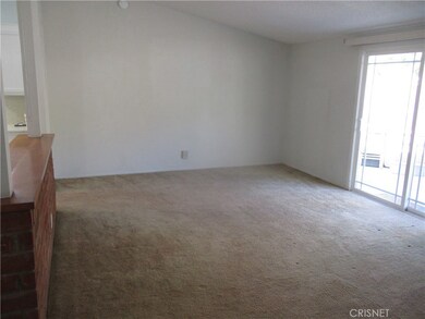 Living room with newer vinyl Slider