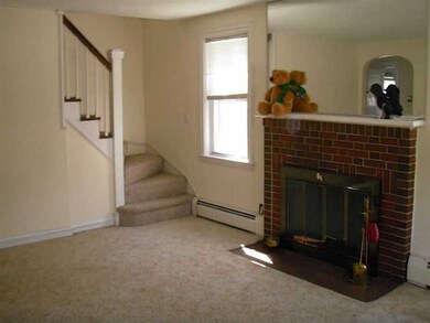 Living Room. Hardwoods underneath carpet.