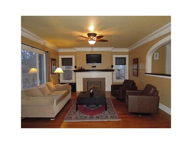 Living Room. Archways and oak flooring