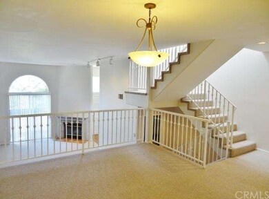 Formal dining room with living room in background