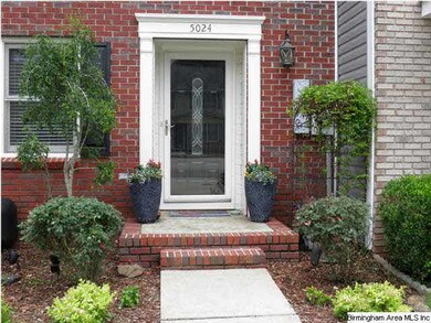 Curb appeal is phenomenal with beautiful flower be