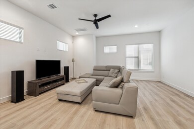 Spacious living area with tons of natural light!