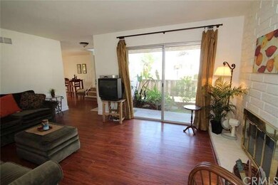 Front living room has sliding doors that lead to t