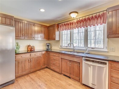 Beautiful Kitchen with Hardwood Floors,  and Grani