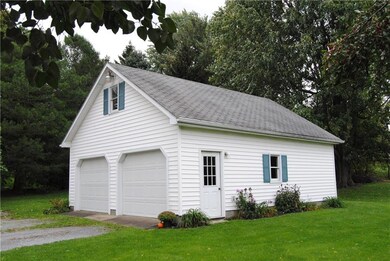 Insulated 2.5 car garage with electric and featuri