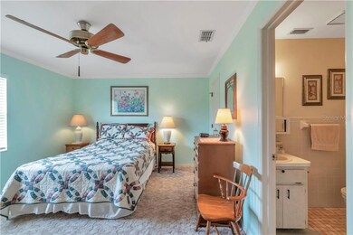 This is the master bedroom, ceiling fan, carpeting