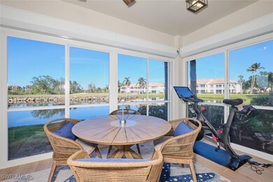 Sunroom with a water view