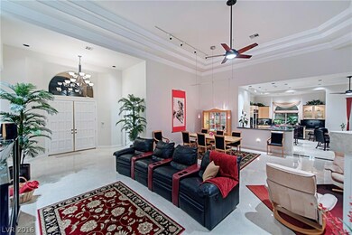 The spacious great room has a fireplace, trey ceil