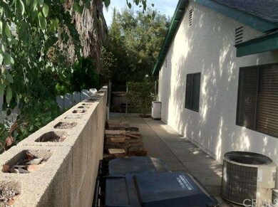 Dog run/storage area along the south side of prope