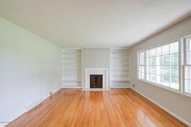 HUGE LIVING ROOM w/fireplace