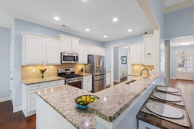 Light-Filled Kitchen with Freshly Painted Cabinets, Custom Pantry Shelving & Open Flow to Vaulted Living Room Designed for Effortless Living & Easy Entertaining!