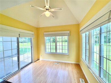 Informal Eating area in the kitchen with vaulted c