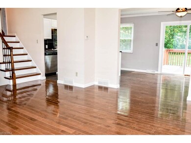 The living room is open to the dining room.