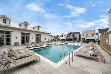 A refreshing resort-style pool area with Grilling