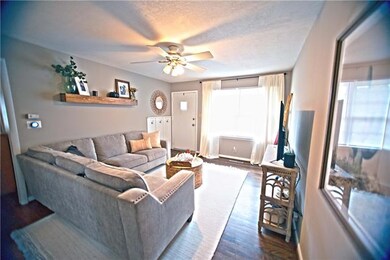 Updated front Living Room with hardwood Floors and