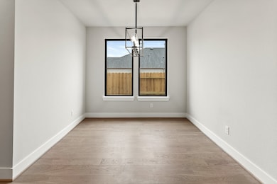 Formal dining and wood floors throughout first flo