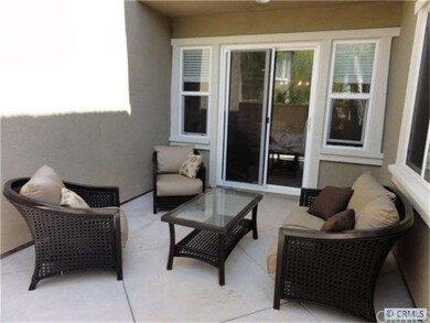 Side Patio across from Formal Dining Room.