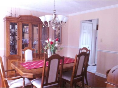 Dining Room. Hardwood floors and soft colors in the dining room, with plenty of room to serve all your holiday gatherers