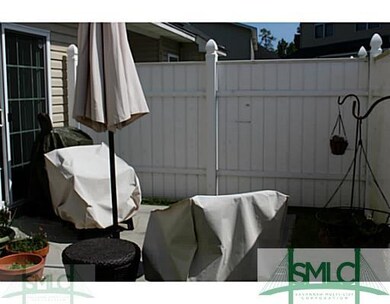 Exterior Back. Courtyard located off kitchen.