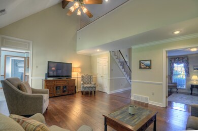 The Great Room features hand scraped hardwood floo