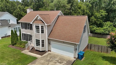 AMPLE PARKING IN THE GARAGE OR SPACIOUS DRIVEWAY