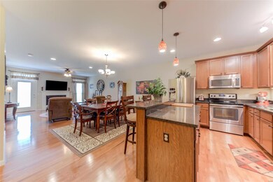 Overall view of the kitchen, breakfast room, and g